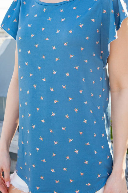 From casual days to dressier evenings, the flutter detail makes this knit top stand out.
