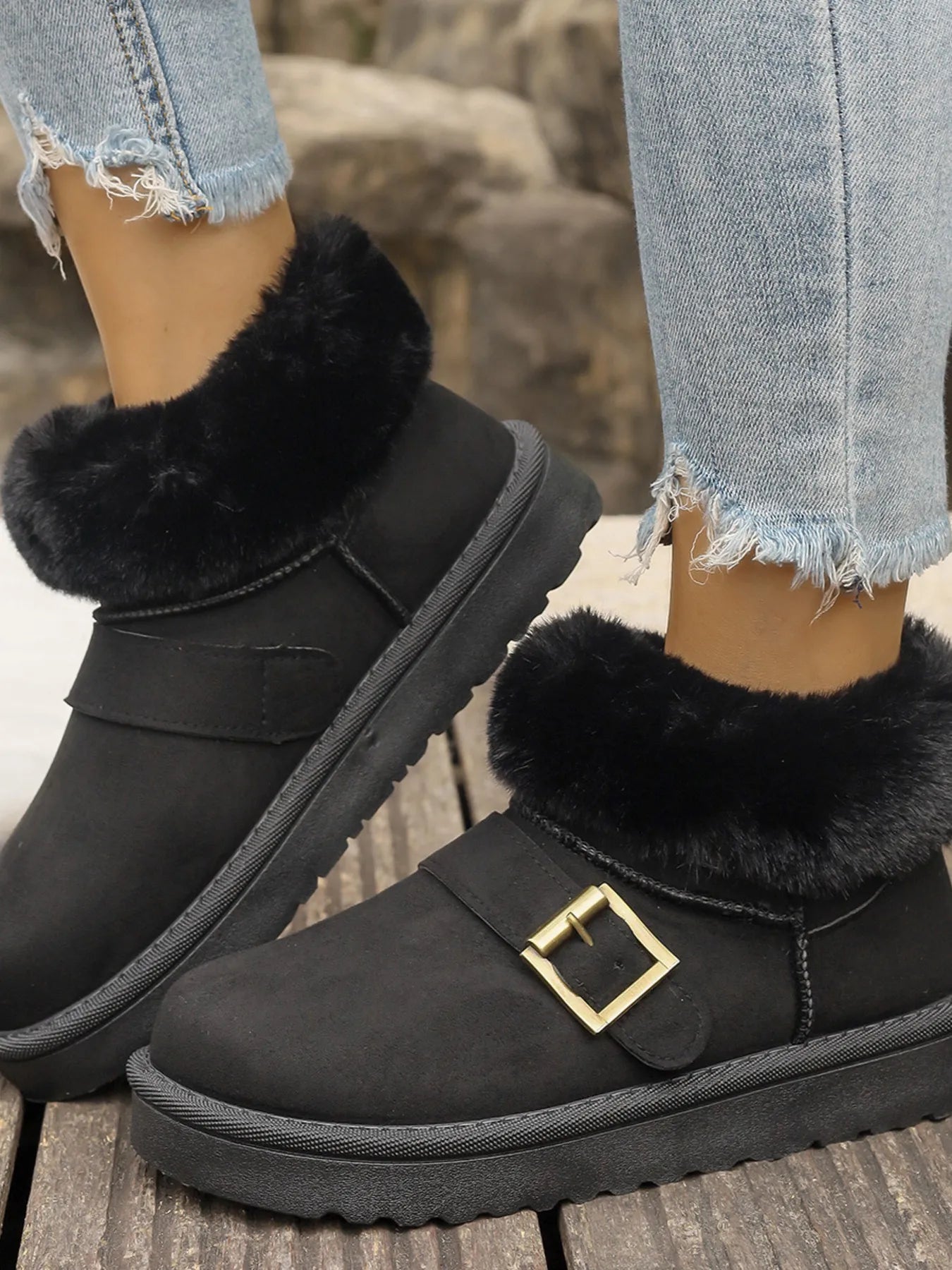 Ankle boots with faux fur trim, side buckle detail, platform sole, and slip-on design shown in multiple shades