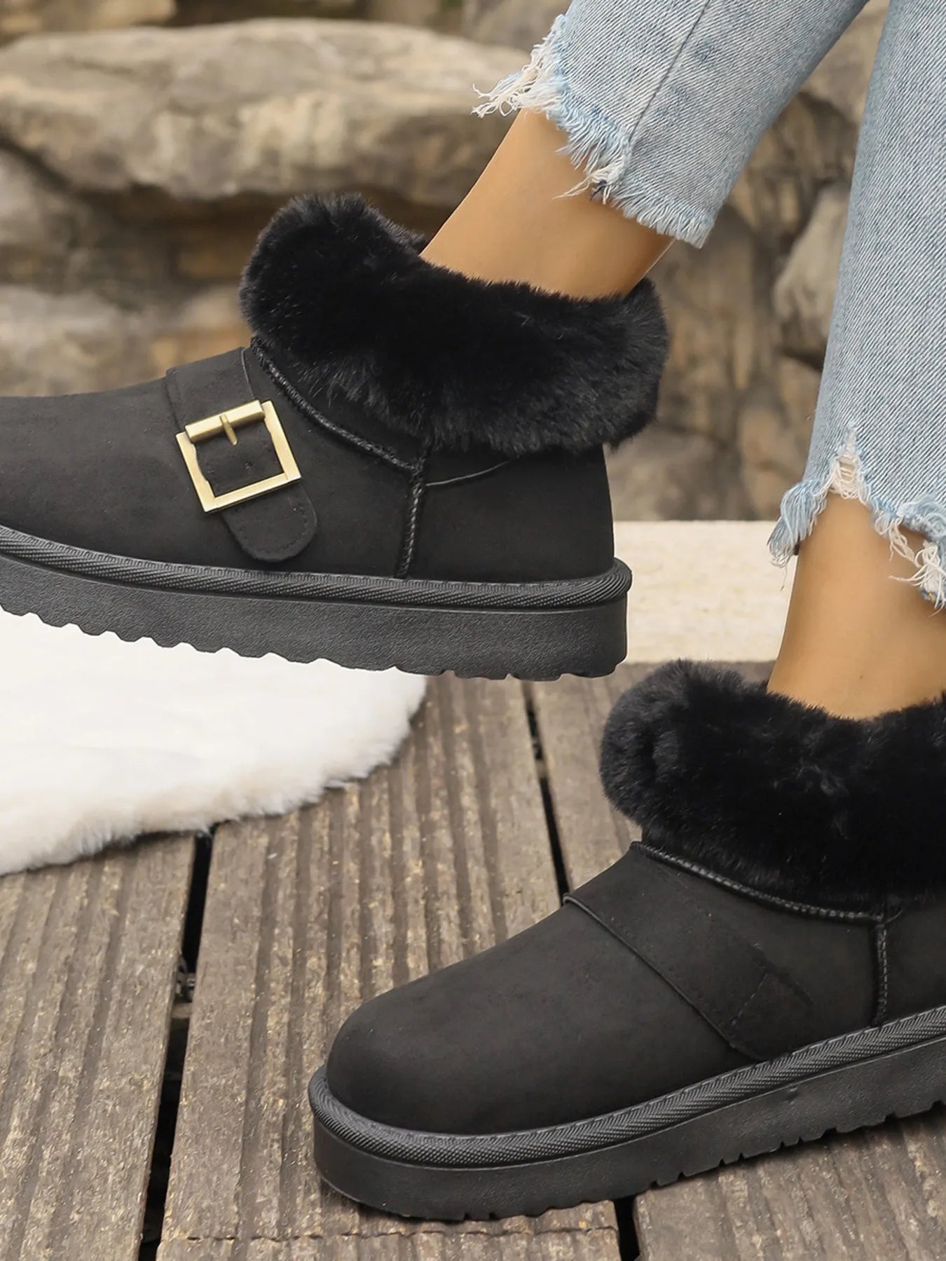 Ankle boots with faux fur trim, side buckle detail, platform sole, and slip-on design shown in multiple shades