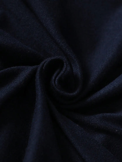Close-up of dark blue fabric with folds