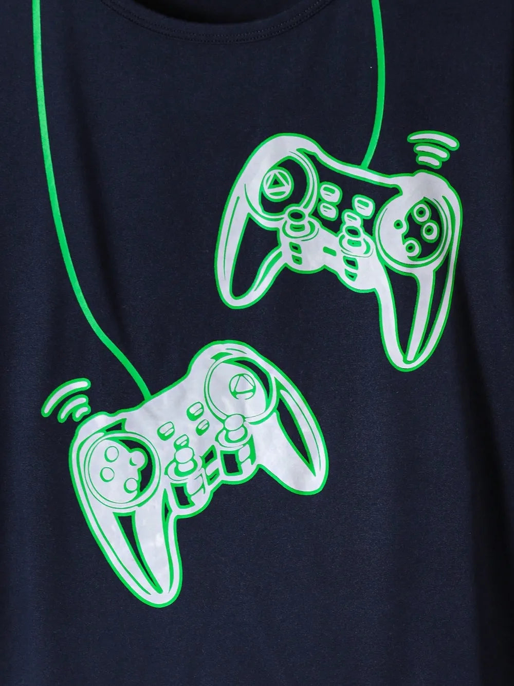 Navy blue t-shirt with green neon outlines of two gaming controllers on a dark background