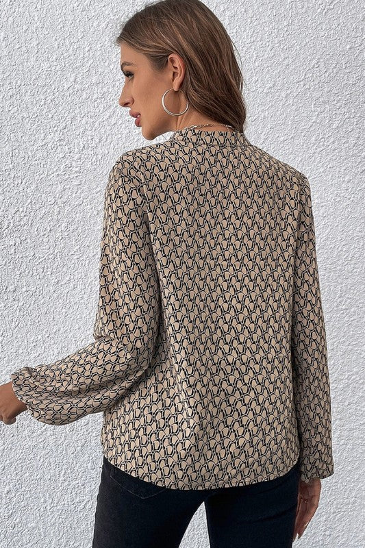 Puff sleeves bring volume and a touch of romantic silhouette.
