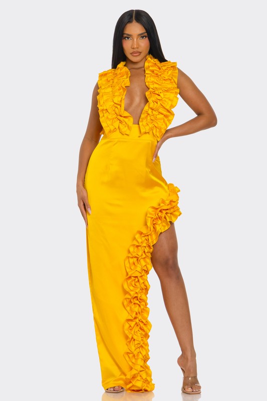 A bright yellow, one-shoulder dress with ruffle detailing along the neckline and a high side slit.