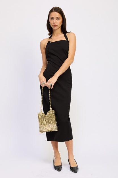 Woman models a chic halter neck midi dress in a black color, featuring an elegant design.