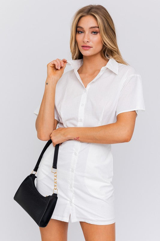 Half-sleeve shirt mini dress with collared neckline and button front, relaxed yet structured style ideal for daywear or casual outings