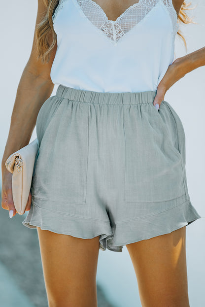 Sweet meets chic. These high-waisted ruffle shorts are the perfect blend of feminine charm and everyday comfort. With a flattering silhouette and practical pockets, they’re ready for brunch dates, beach strolls, or casual days out.