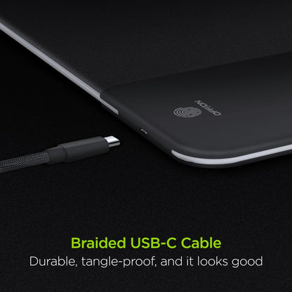 A flexible HYPERGEAR gaming mouse pad with RGB lighting and built-in wireless charging, featuring plug-and-play setup.