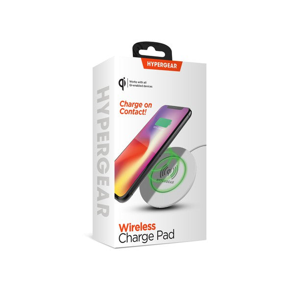 A HYPERGEAR Qi wireless charging pad powering a smartphone to 100%, with a connected cable and glowing charge indicator.