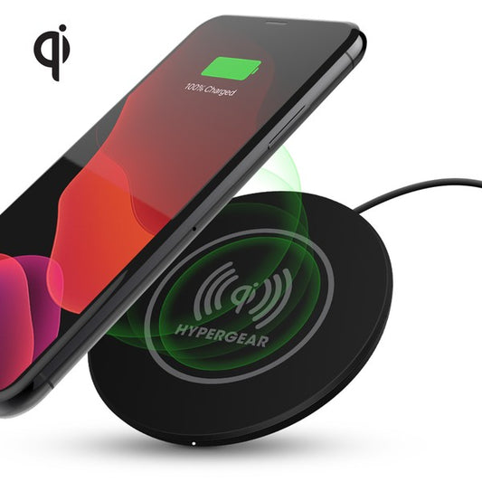 A HYPERGEAR Qi wireless charging pad powering a smartphone to 100%, with a connected cable and glowing charge indicator.