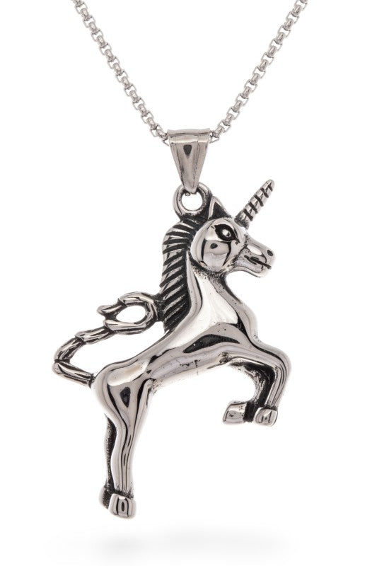 This image shows a silver unicorn pendant on a chain. The unicorn is posed on its hind legs with one front leg raised. It has a spiralled horn and a cut mane. The background is plain white.
