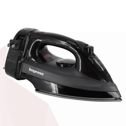 Black Impress steam iron standing upright with a temperature dial, steam control knob, and red indicator light—next to a small transparent measuring cup.