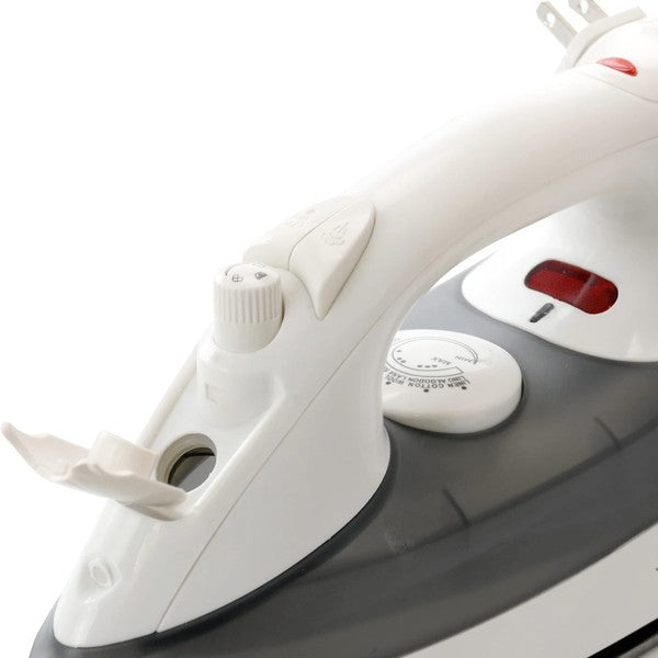 White and black Impress steam iron standing upright with a temperature dial, steam control knob, and red indicator light—next to a small transparent measuring cup.