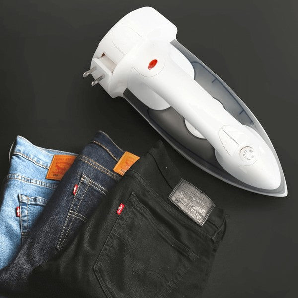 White handheld device positioned above three Levi's jeans—light blue, dark blue, and black—suggesting a tech interaction with fashion.