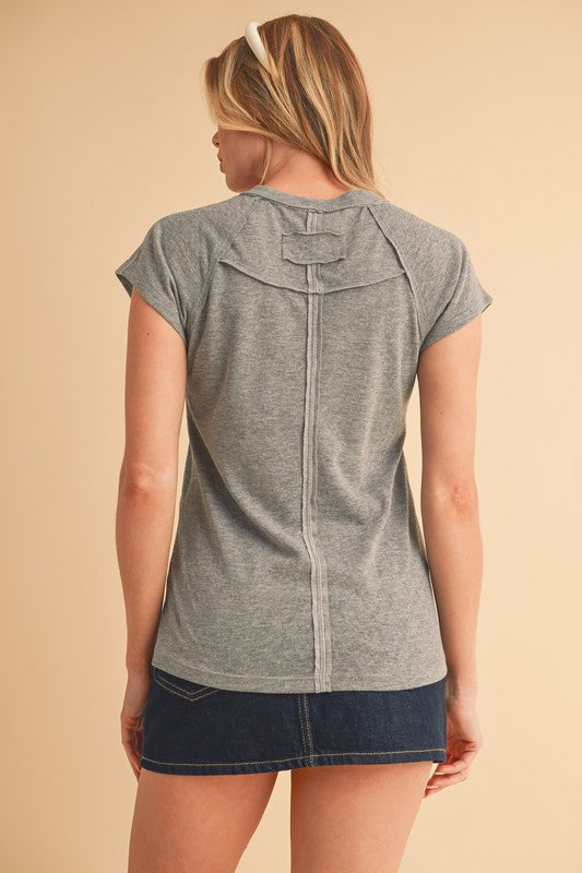 Wear it tucked in or left loose for variety.