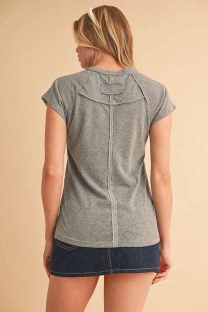 Wear it tucked in or left loose for variety.