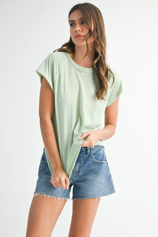 Minimalist design pairs with statement accessories.