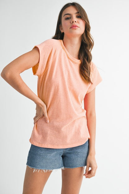 Hits around hip-length — works great with high-waisted jeans or shorts.