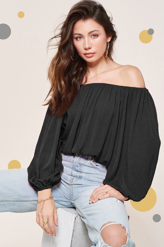 Off-shoulder design brings a trendy, feminine edge. 