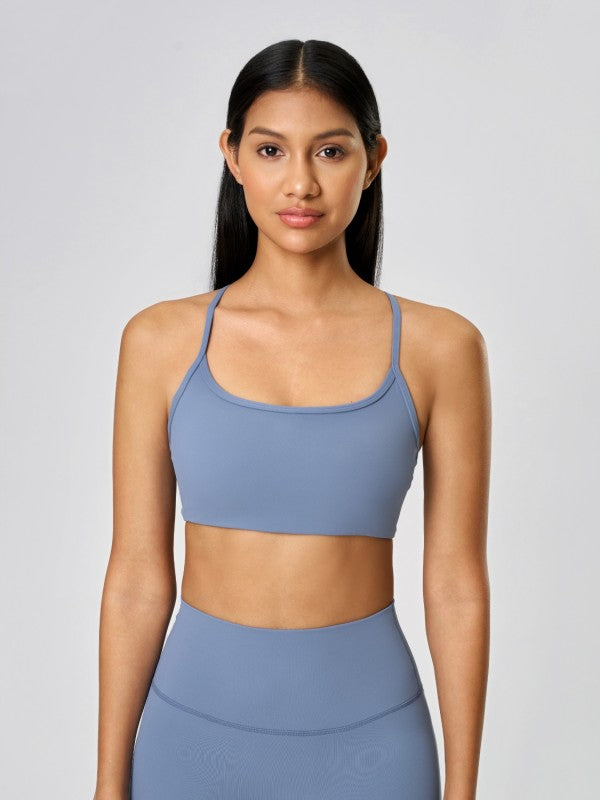 Flirty straps. Functional fit. The JupiterGear Crisscross Cami is your go-to for layering, lounging, or light workouts. With a sleek silhouette and delicate crisscross back straps, it’s designed to move with you while adding a touch of flair to your everyday look.