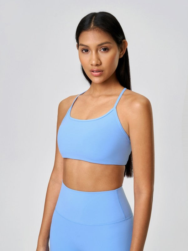 Made from soft, breathable fabric with just the right amount of stretch, this cami hugs your shape without feeling tight. Whether you're pairing it with leggings for yoga or denim for brunch, it’s the kind of top that works wherever you go.
