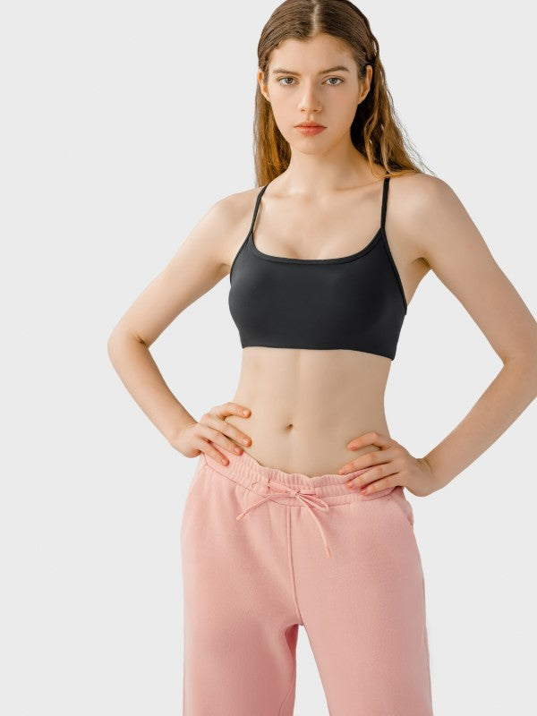 Made from soft, breathable fabric with just the right amount of stretch, this cami hugs your shape without feeling tight. Whether you're pairing it with leggings for yoga or denim for brunch, it’s the kind of top that works wherever you go