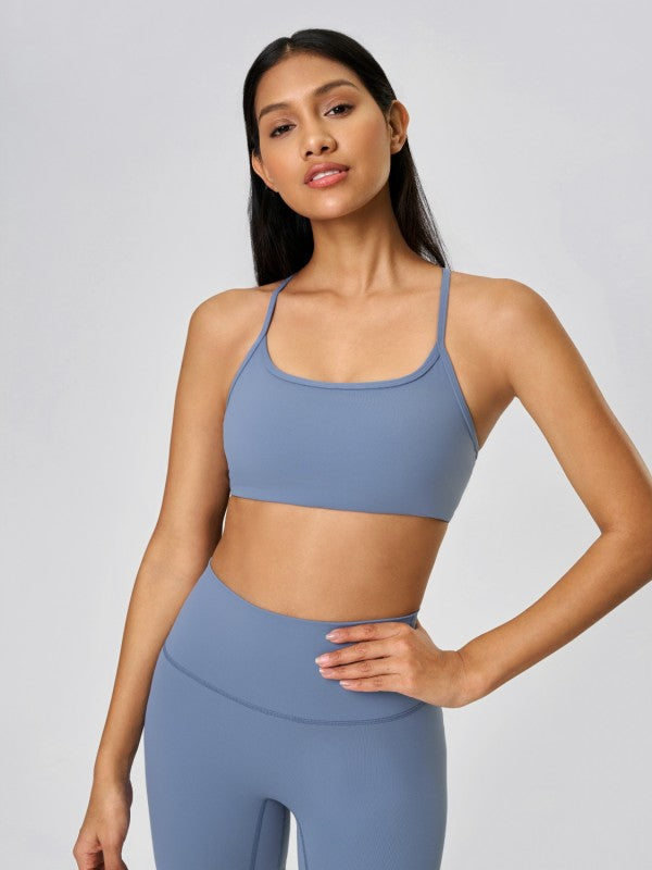 Made from soft, breathable fabric with just the right amount of stretch, this cami hugs your shape without feeling tight. Whether you're pairing it with leggings for yoga or denim for brunch, it’s the kind of top that works wherever you go