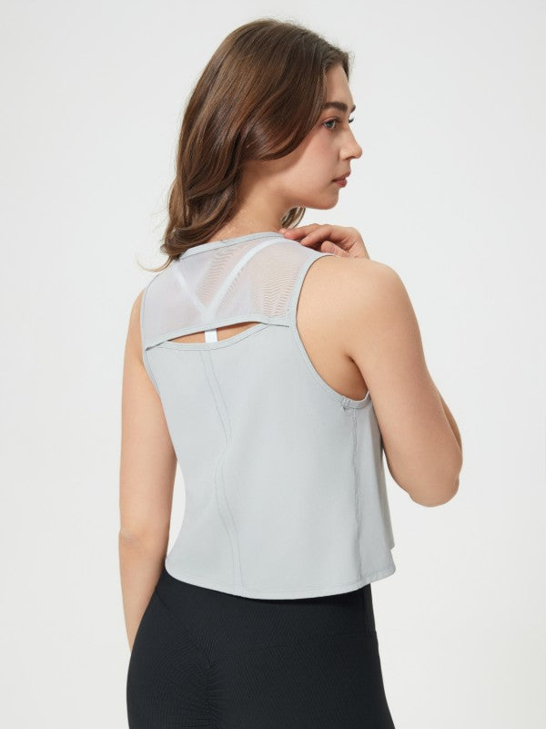 Flattering fit. Effortless style. The JupiterGear Round-Neck Cropped Tank is your new go-to for workouts, layering, and laid-back days. With a clean round neckline and a cropped silhouette that hits just right, this tank blends sporty function with everyday fashion.