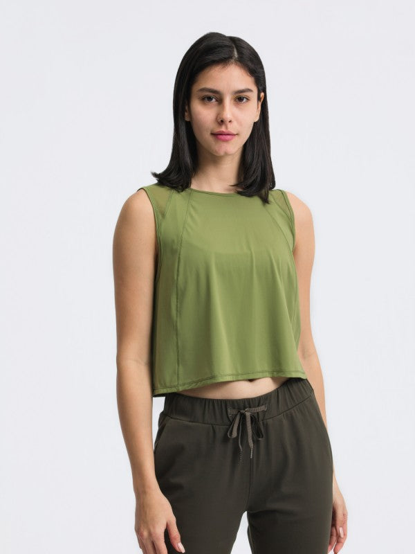 Flattering fit. Effortless style. The JupiterGear Round-Neck Cropped Tank is your new go-to for workouts, layering, and laid-back days. With a clean round neckline and a cropped silhouette that hits just right, this tank blends sporty function with everyday fashion.