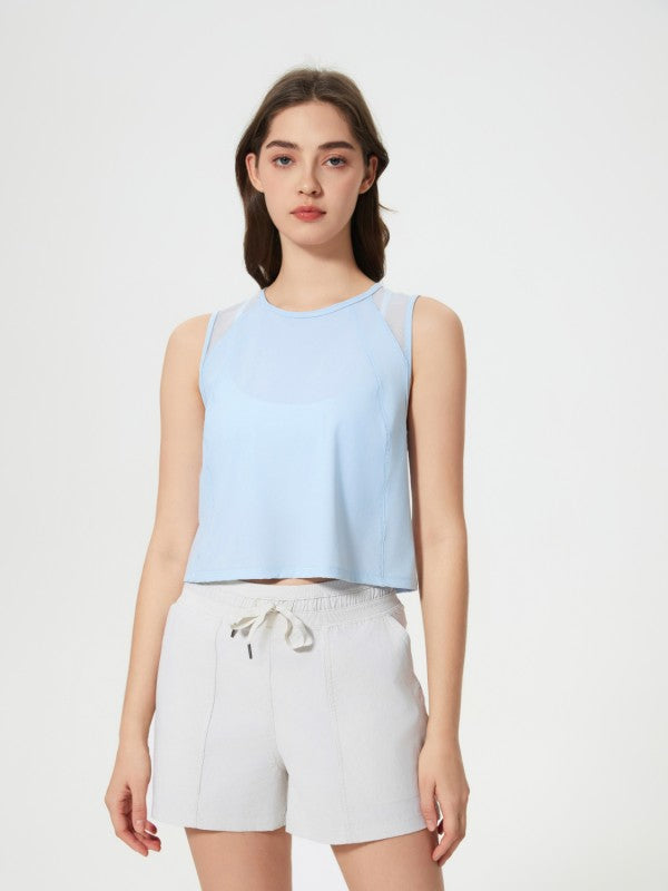 Flattering fit. Effortless style. The JupiterGear Round-Neck Cropped Tank is your new go-to for workouts, layering, and laid-back days. With a clean round neckline and a cropped silhouette that hits just right, this tank blends sporty function with everyday fashion.