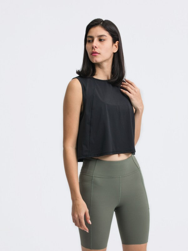 Flattering fit. Effortless style. The JupiterGear Round-Neck Cropped Tank is your new go-to for workouts, layering, and laid-back days. With a clean round neckline and a cropped silhouette that hits just right, this tank blends sporty function with everyday fashion.