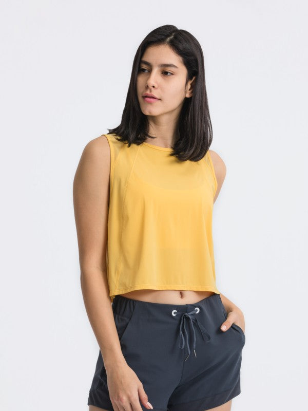 Flattering fit. Effortless style. The JupiterGear Round-Neck Cropped Tank is your new go-to for workouts, layering, and laid-back days. With a clean round neckline and a cropped silhouette that hits just right, this tank blends sporty function with everyday fashion.