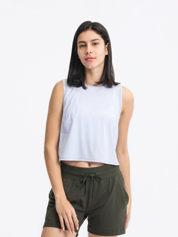 Flattering fit. Effortless style. The JupiterGear Round-Neck Cropped Tank is your new go-to for workouts, layering, and laid-back days. With a clean round neckline and a cropped silhouette that hits just right, this tank blends sporty function with everyday fashion.