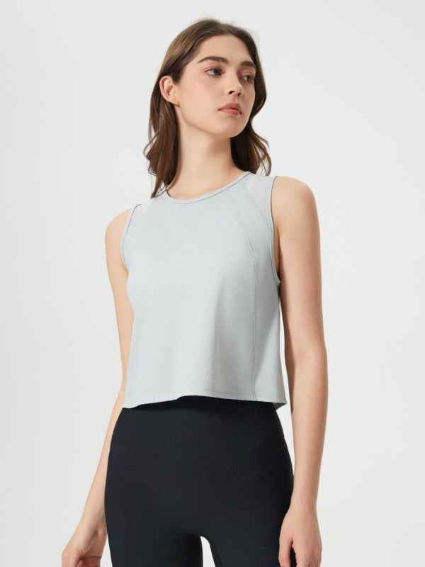 Flattering fit. Effortless style. The JupiterGear Round-Neck Cropped Tank is your new go-to for workouts, layering, and laid-back days. With a clean round neckline and a cropped silhouette that hits just right, this tank blends sporty function with everyday fashion.