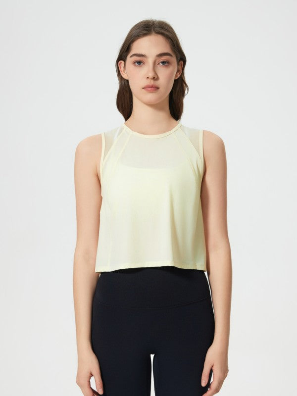 Flattering fit. Effortless style. The JupiterGear Round-Neck Cropped Tank is your new go-to for workouts, layering, and laid-back days. With a clean round neckline and a cropped silhouette that hits just right, this tank blends sporty function with everyday fashion.