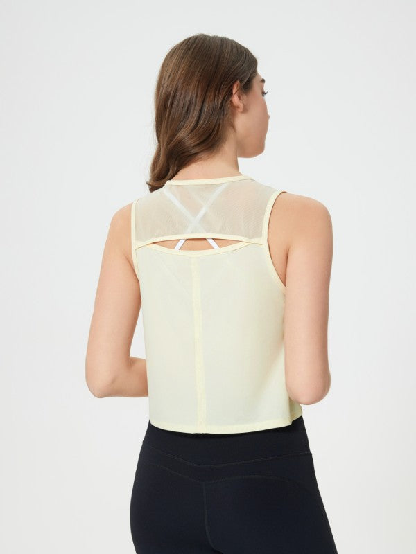 Flattering fit. Effortless style. The JupiterGear Round-Neck Cropped Tank is your new go-to for workouts, layering, and laid-back days. With a clean round neckline and a cropped silhouette that hits just right, this tank blends sporty function with everyday fashion.