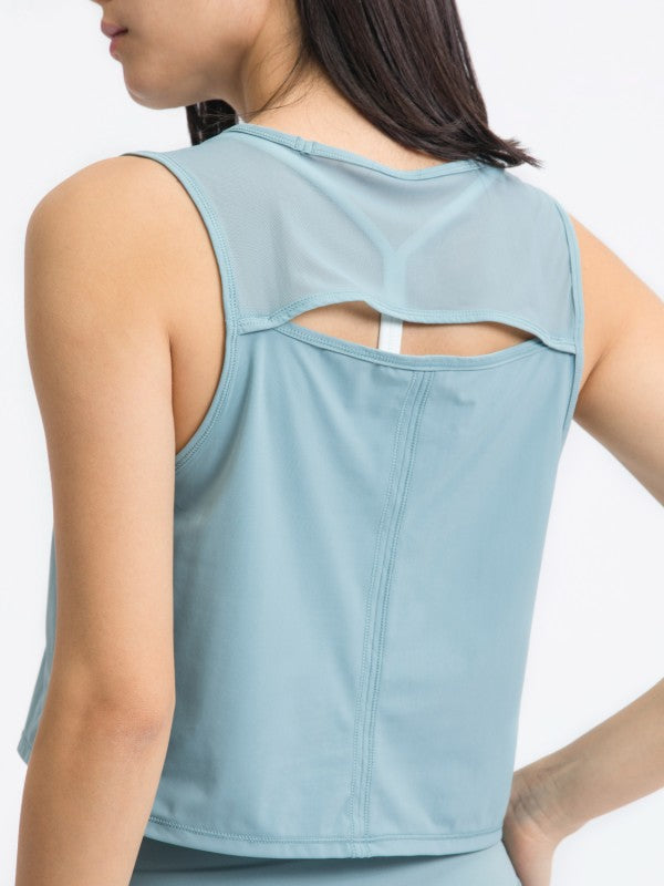 Flattering fit. Effortless style. The JupiterGear Round-Neck Cropped Tank is your new go-to for workouts, layering, and laid-back days. With a clean round neckline and a cropped silhouette that hits just right, this tank blends sporty function with everyday fashion.