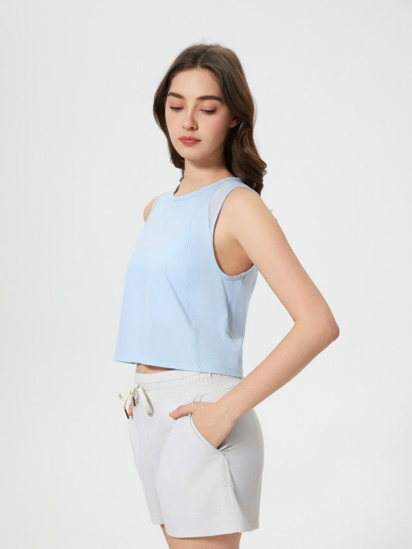 Flattering fit. Effortless style. The JupiterGear Round-Neck Cropped Tank is your new go-to for workouts, layering, and laid-back days. With a clean round neckline and a cropped silhouette that hits just right, this tank blends sporty function with everyday fashion.