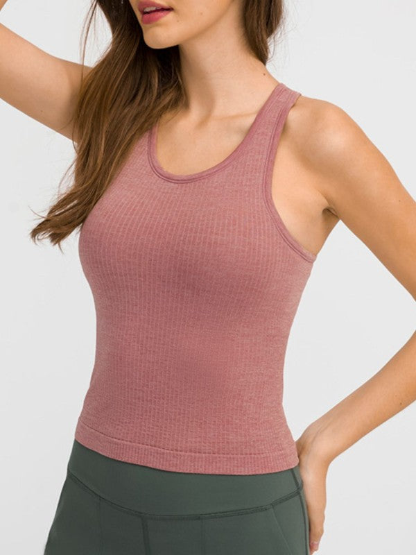 Smooth, sleek, and built to move. The JupiterGear Round Neck Racerback Tank is your everyday essential for workouts, errands, and everything in between. With a flattering round neckline and a racerback cut that frees your shoulders, this tank blends performance with polish.