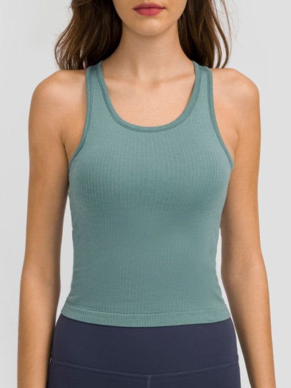 Smooth, sleek, and built to move. The JupiterGear Round Neck Racerback Tank is your everyday essential for workouts, errands, and everything in between. With a flattering round neckline and a racerback cut that frees your shoulders, this tank blends performance with polish.