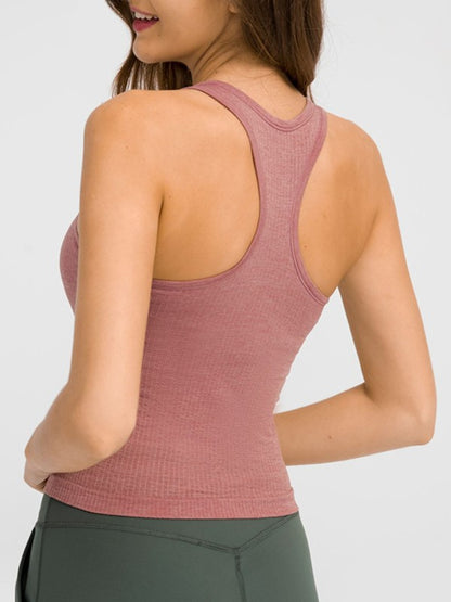 Smooth, sleek, and built to move. The JupiterGear Round Neck Racerback Tank is your everyday essential for workouts, errands, and everything in between. With a flattering round neckline and a racerback cut that frees your shoulders, this tank blends performance with polish.