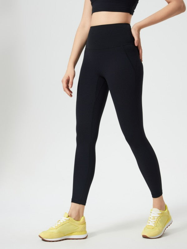 These leggings don’t just fit—they flatter. The JupiterGear Wide Waistband Leggings are your secret weapon for looking fierce and feeling unstoppable. Designed with a high-rise, wide waistband that smooths, shapes, and stays put, they’re built for movement and made for compliments.