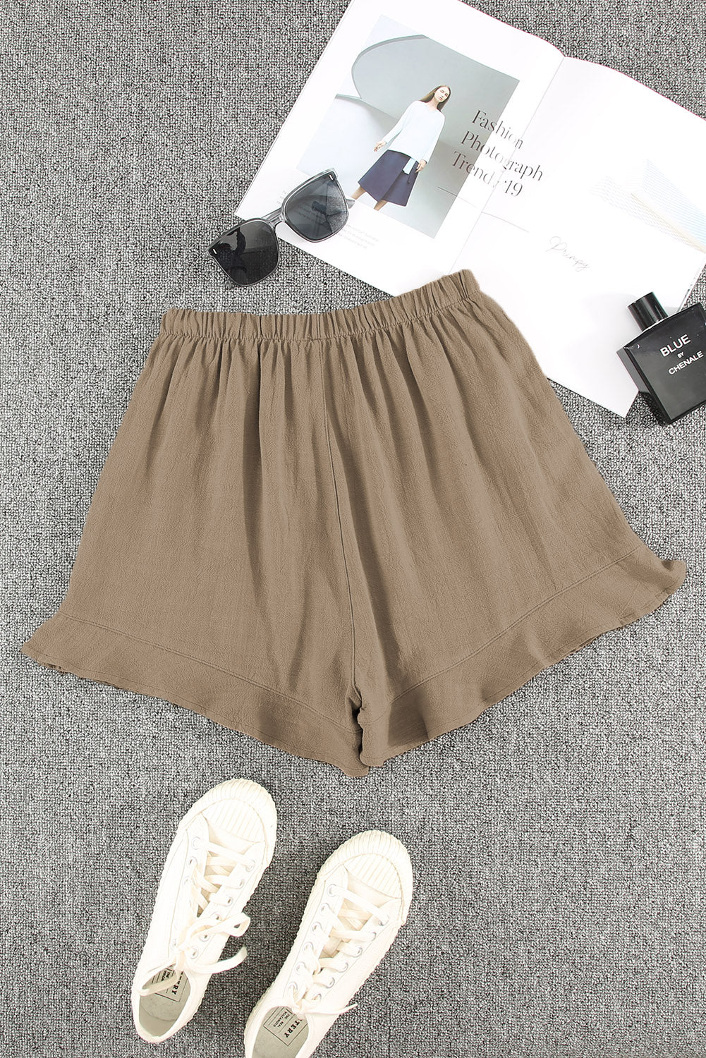 These khaki ruffle shorts are designed to flatter your figure while keeping things light and breezy. With a high-rise fit, soft fabric, and practical pockets, they’re perfect for sunny days and laid-back outings.