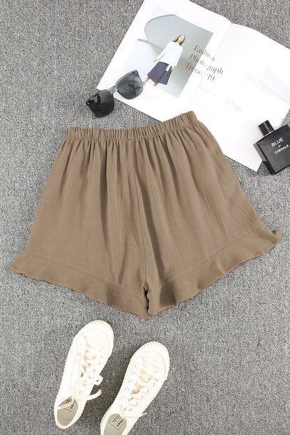 These khaki ruffle shorts are designed to flatter your figure while keeping things light and breezy. With a high-rise fit, soft fabric, and practical pockets, they’re perfect for sunny days and laid-back outings.