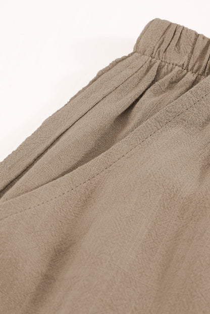 These khaki ruffle shorts are designed to flatter your figure while keeping things light and breezy. With a high-rise fit, soft fabric, and practical pockets, they’re perfect for sunny days and laid-back outings.