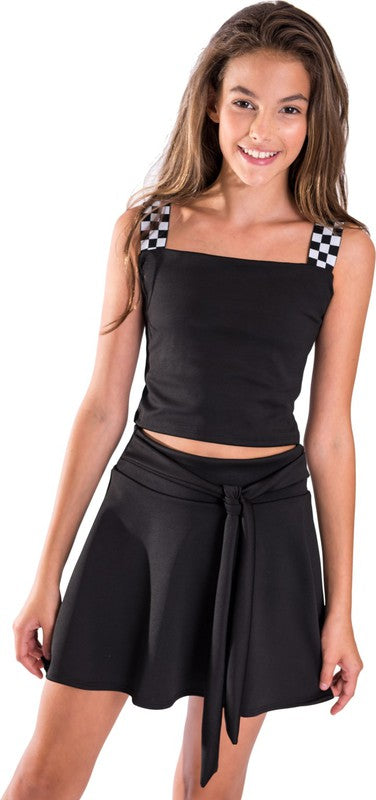 Kids crop top with black-and-white checkerboard elastic straps and square neckline — snug fit, breathable fabric, ideal for summer wear