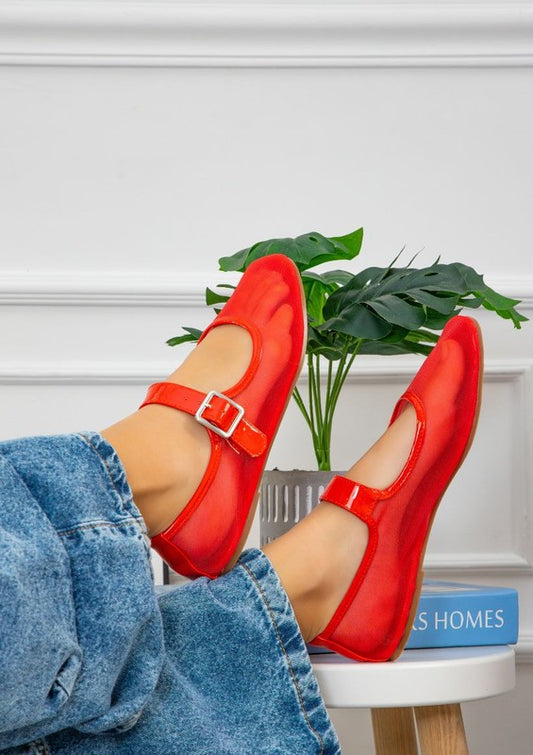 Jelly sandals featuring ankle strap with buckle closure, rounded closed-toe cut, thick flatform sole, slip-on style