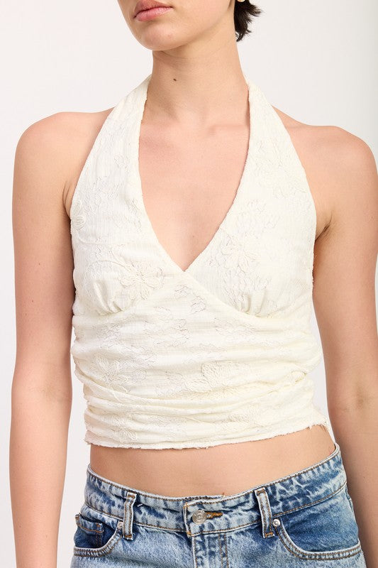 Cropped length — shows off high-waist bottoms or pairs with layered pieces.