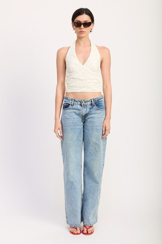 Sleeveless cut keeps it perfect for warm weather or layering under jackets.