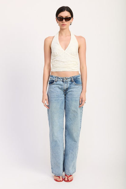 Sleeveless cut keeps it perfect for warm weather or layering under jackets.