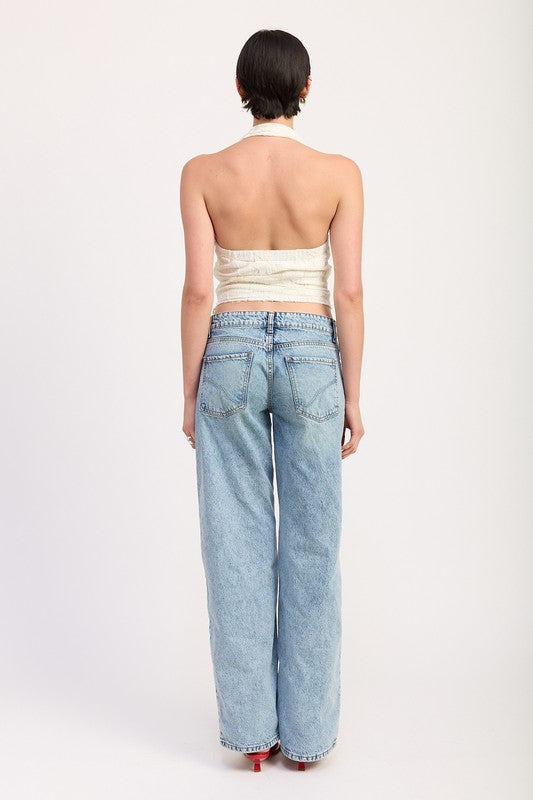 A statement crop top ideal for nights out, festivals, or pairing with denim for edgy style.